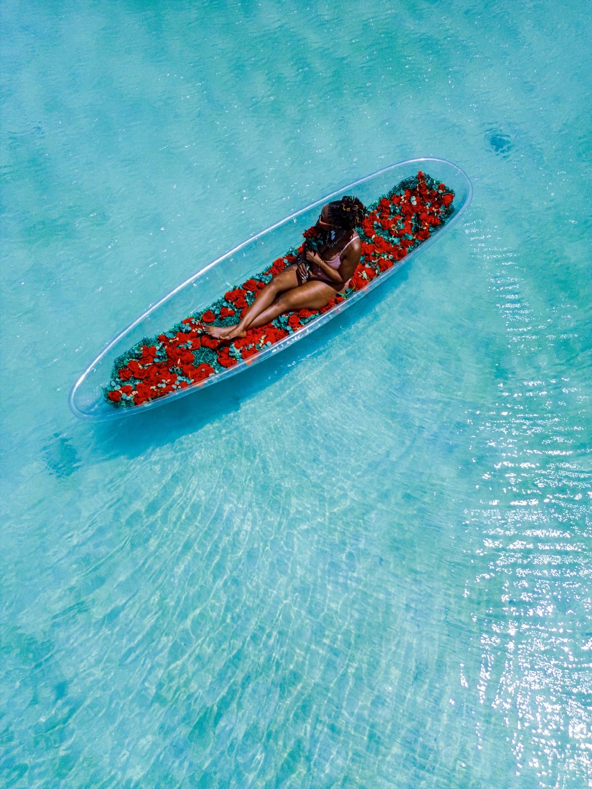 Clear kayak photoshoot on turquoise water