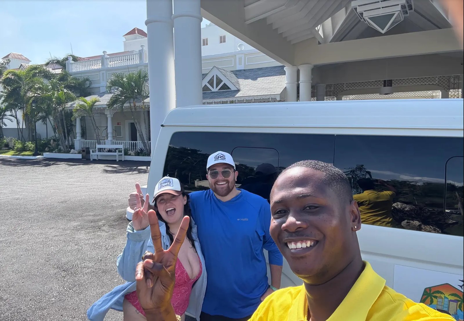 Julia Douglas and her husband with our driver Courtney beside the van